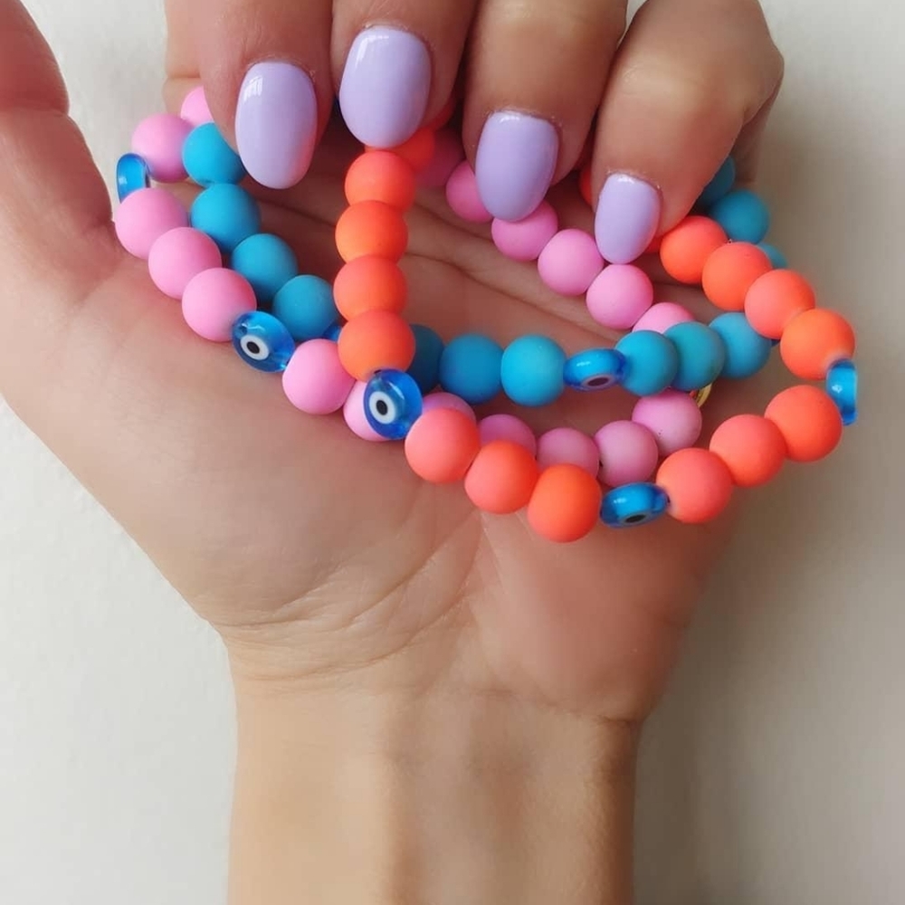 Matte evil eye rubber bead bracelet